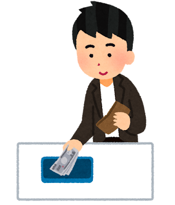 支払いをする男性